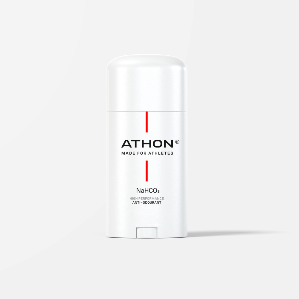 Front package shot of Athon Deodorant - Made for Athletes. A white, oval container with a red stripe down the middle of the front and logo in the centre.